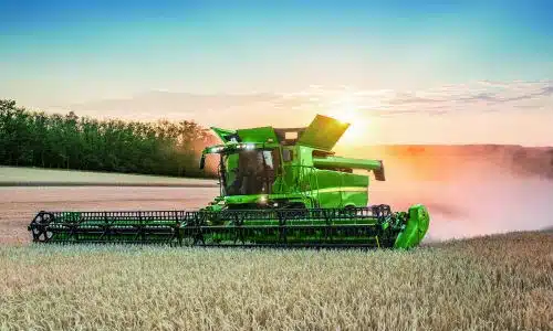 John Deere Combine - Harvesting a field John Deere Combine - Harvesting a field