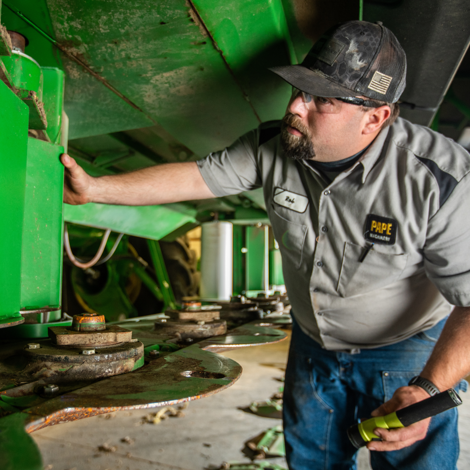 Pape Machinery tech conducting equipment maintenance.