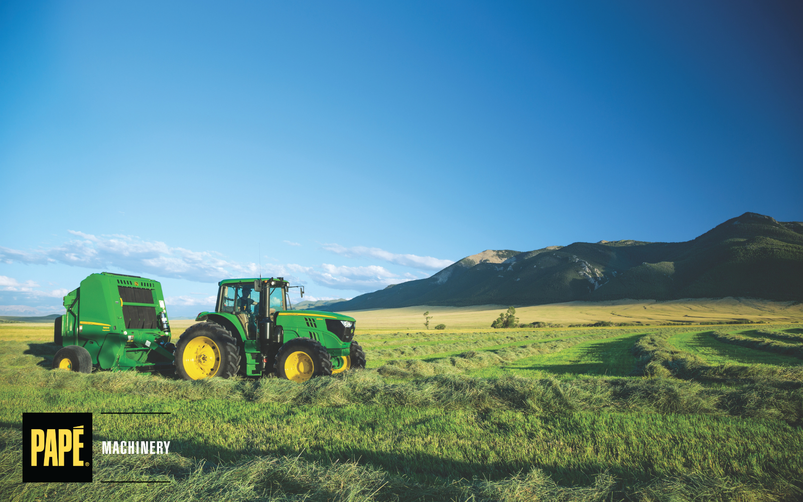 John Deere equipment supporting berry harvest preparation on a blueberry farm in Washington during the summer harvest season.